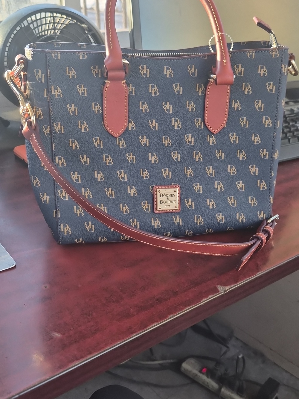 Dooney & Bourke Black and Brown Logo Tote Nwot .Never Used